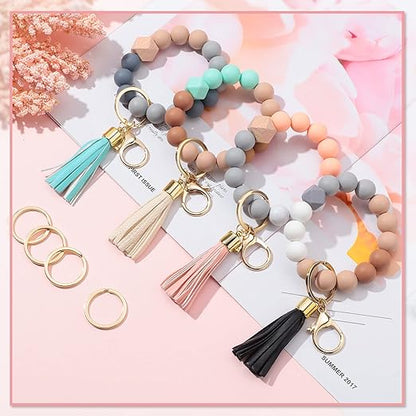 4-Piece Silicone Key Ring Bracelet with Leather Tassel